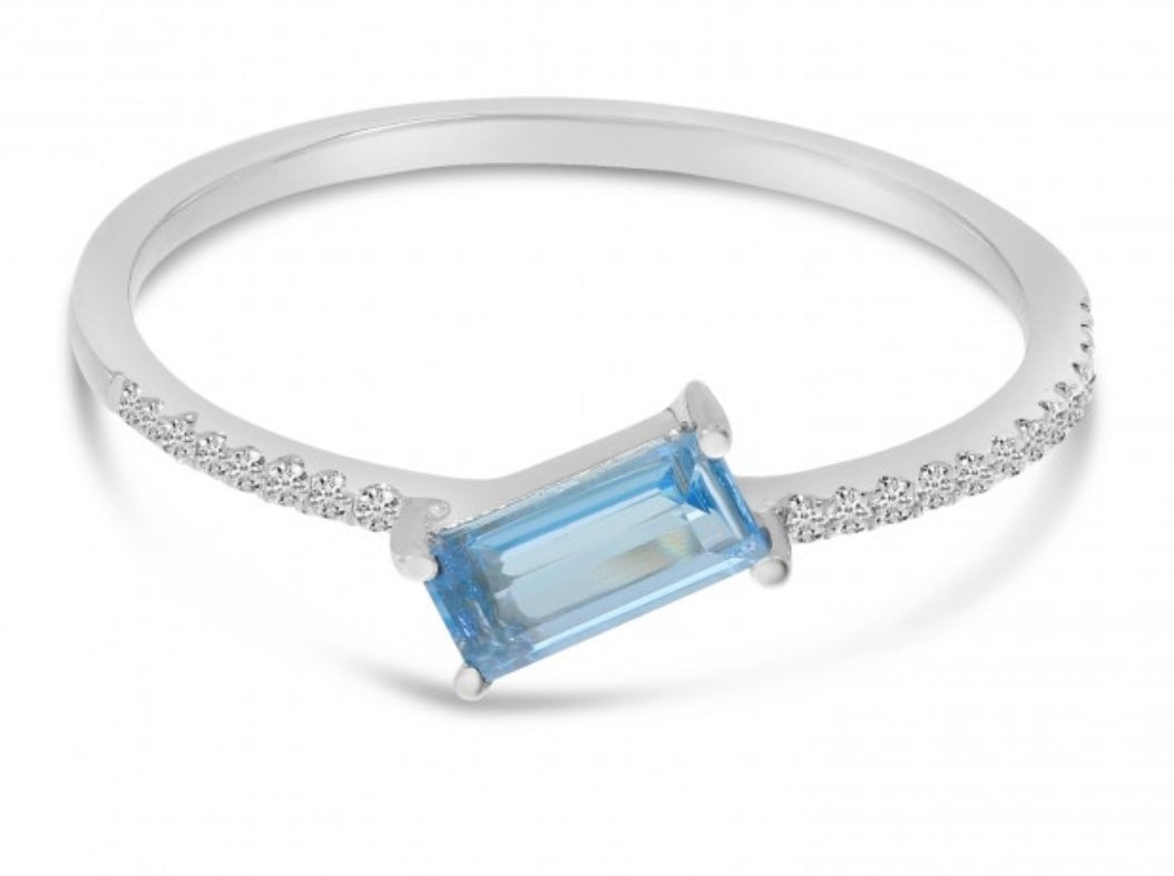 East West Emerald cut Blue Topaz Ring